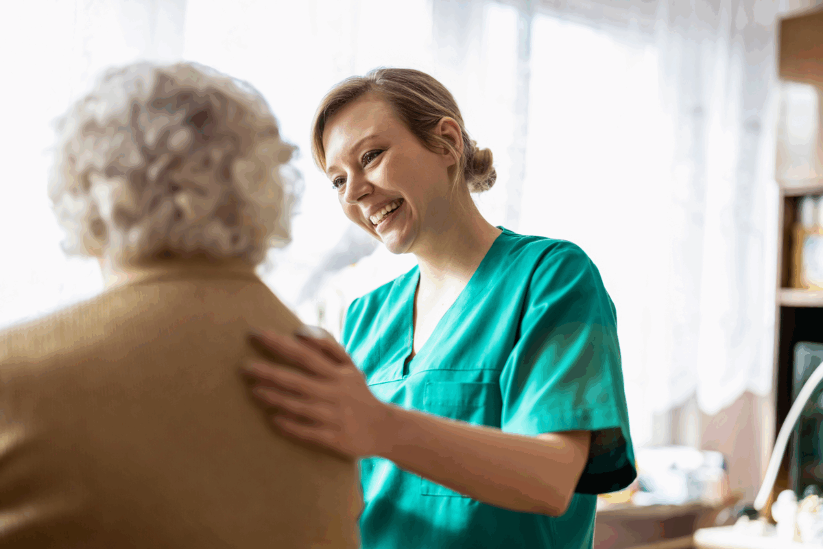 Carer and patient smiling