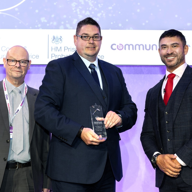 Jamie Williams, Enrichment Manager at HMP Parc, receiving an Inspire Justice Award
