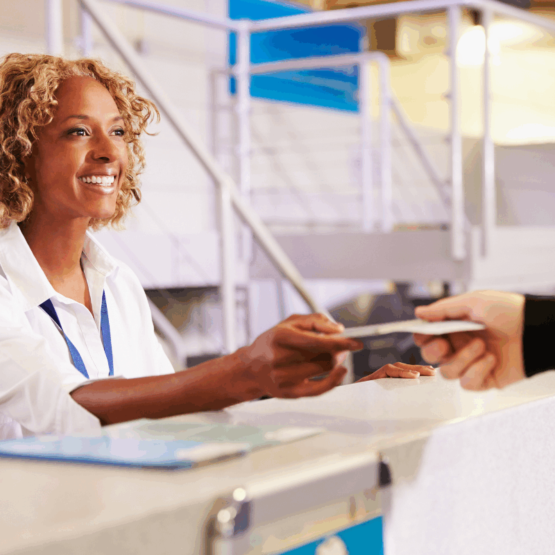 Woman working at check in desk