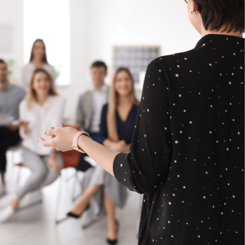 Trainer running a course in an office environment
