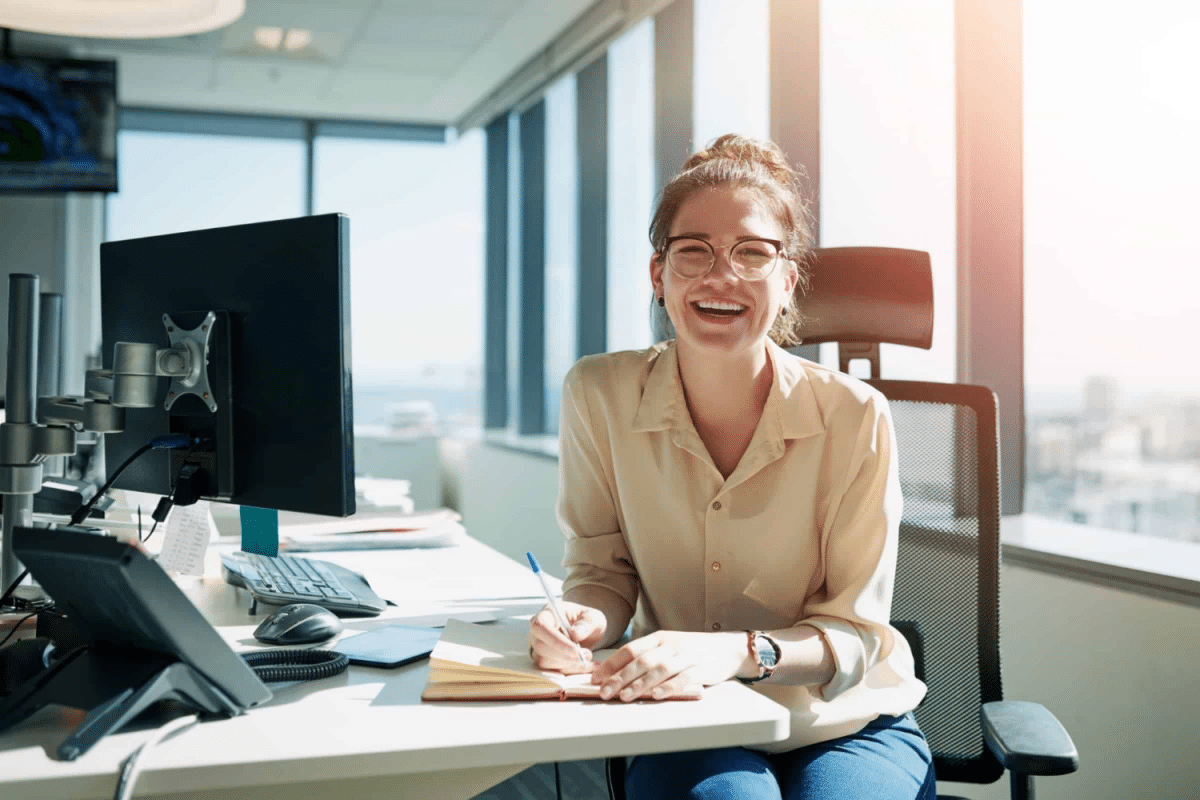 Woman sat at desk in office environment