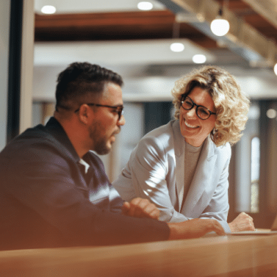 Colleagues smiling together