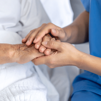 Care worker supporting patient