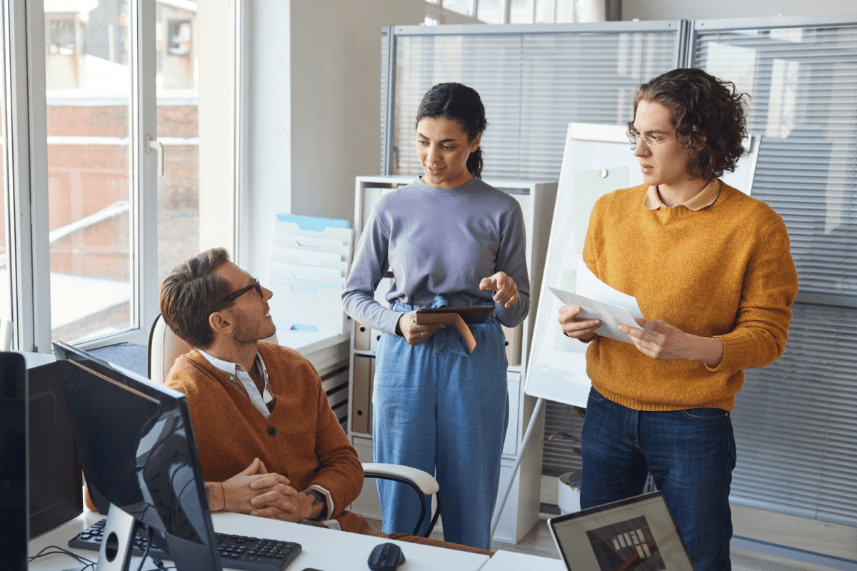 Three colleagues in an office