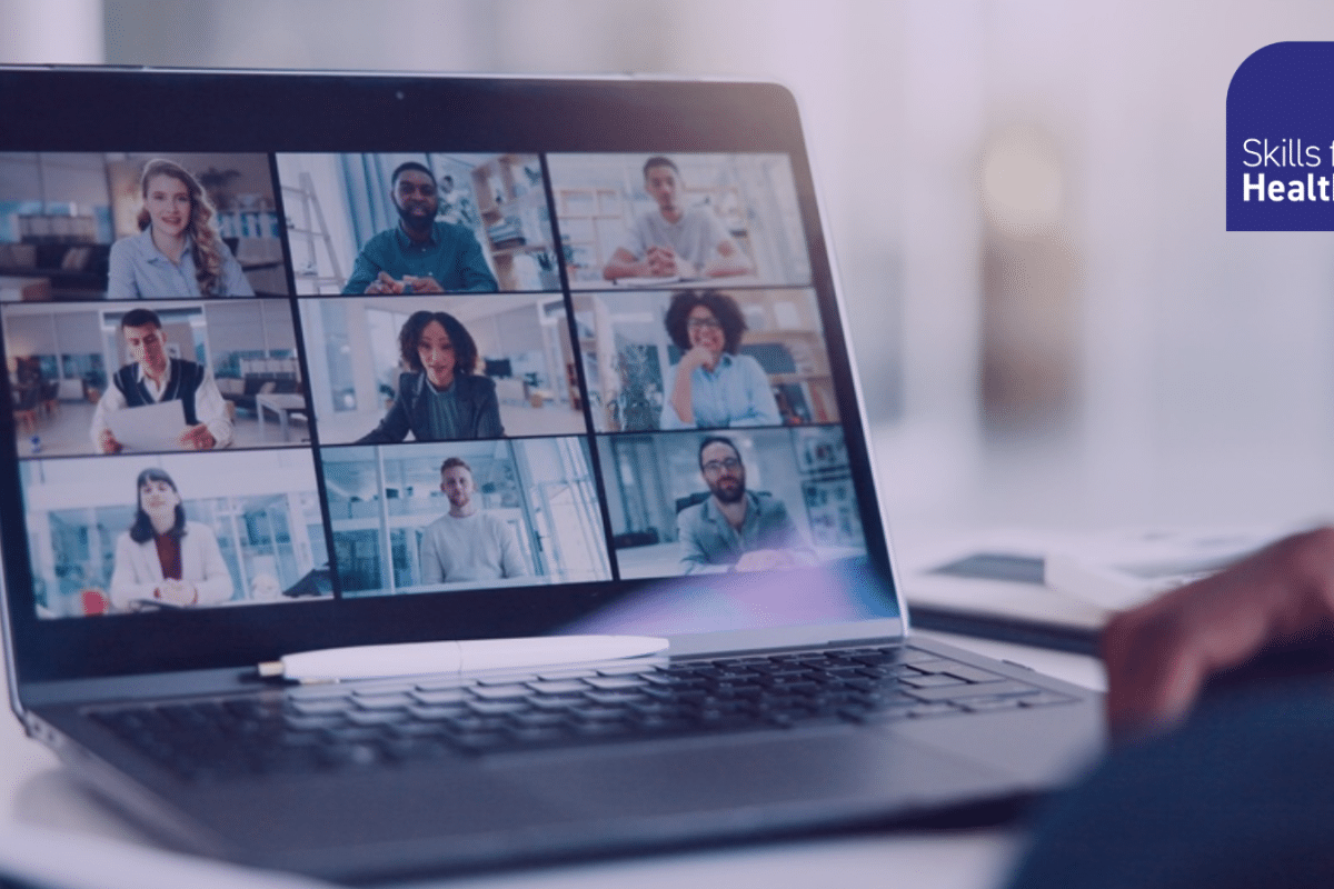 laptop screen showing team virtual meeting