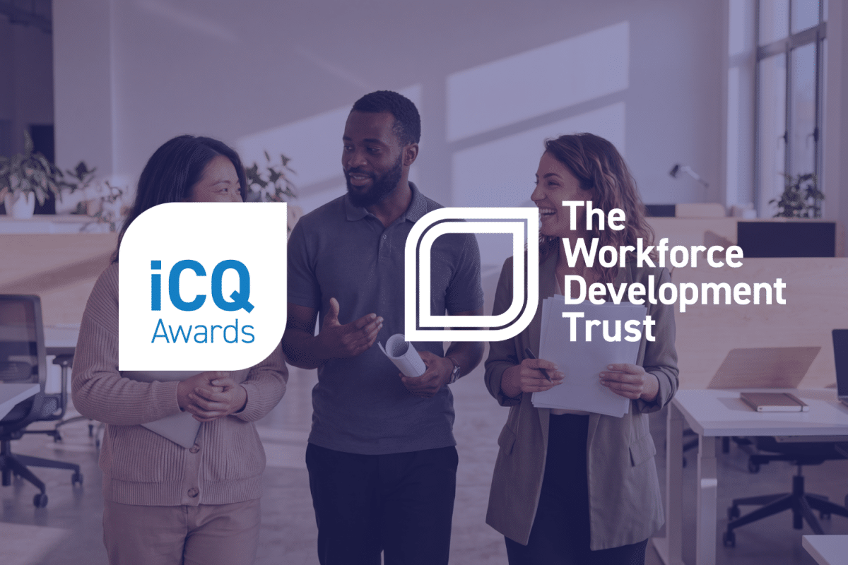 Smiling office workers walking together. iCQ Awards and WDT logo overlayed.