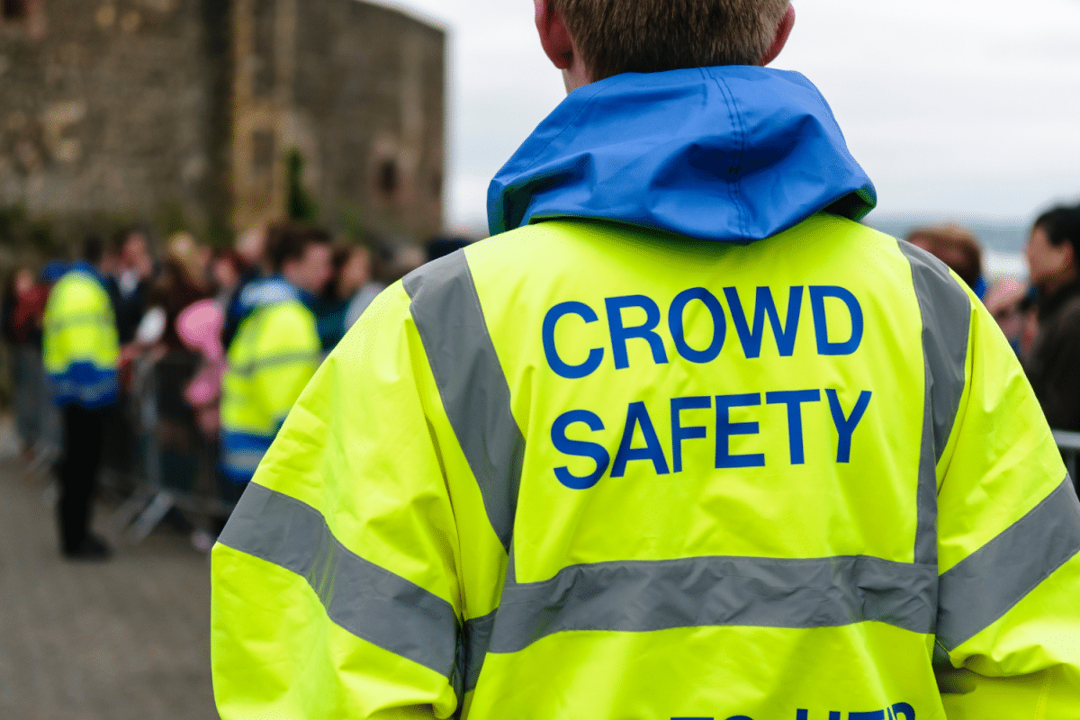 Back of a crowd safety security guard